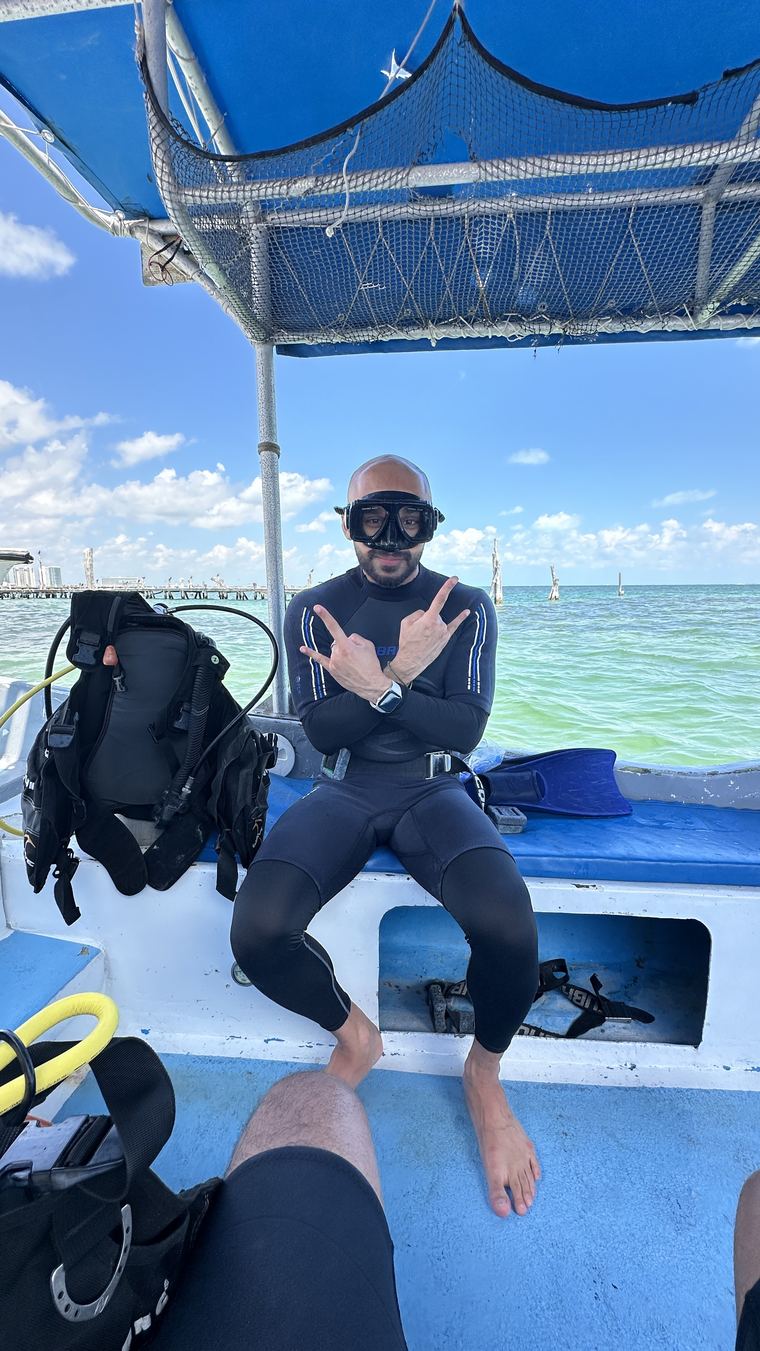 In scuba gear on a dive boat